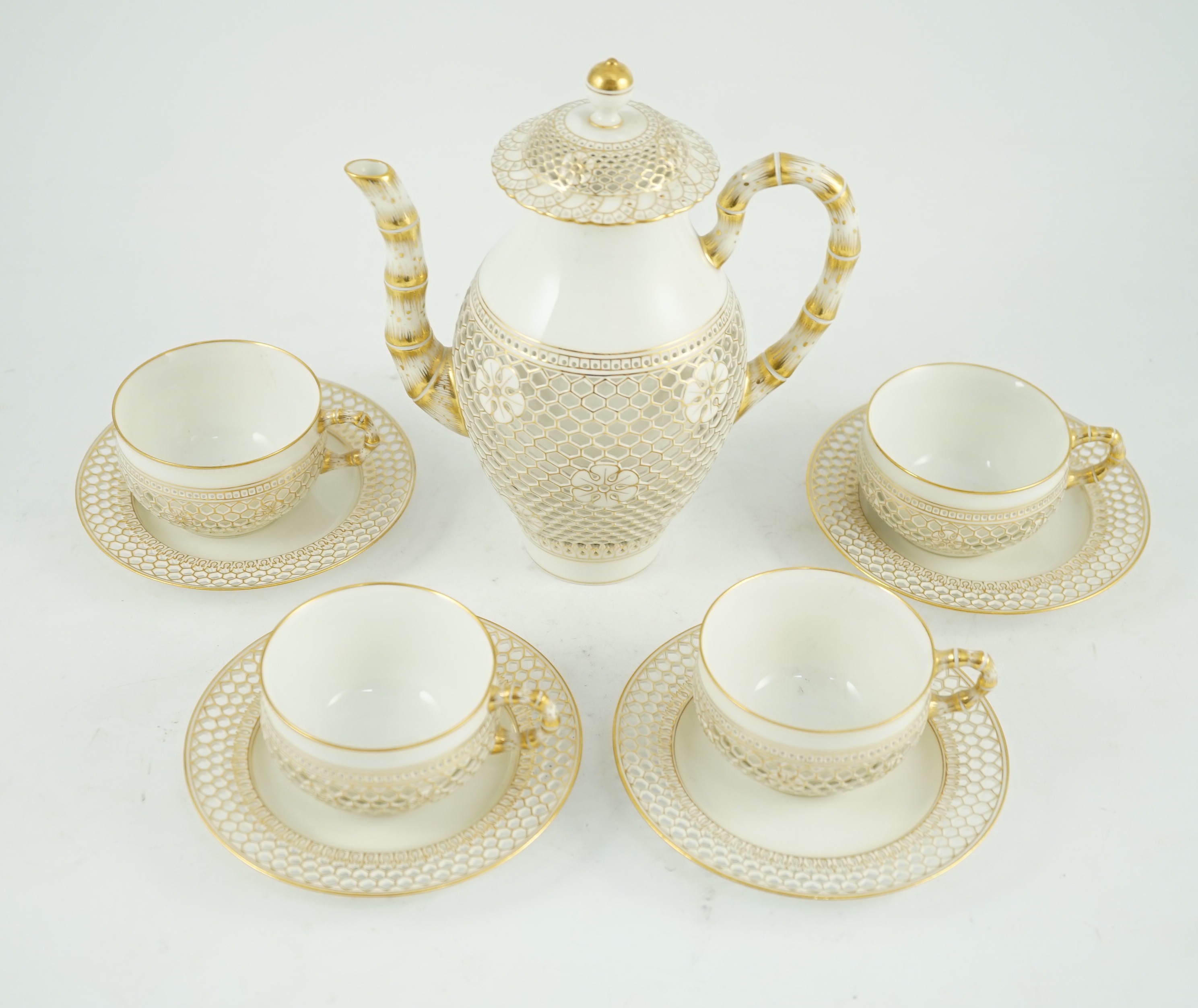 A Sevres reticulated part coffee set, early 20th century, coffee pot 19cm high